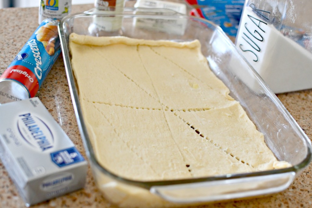 cream cheese sopapilla cheesecake bars using crescent rolls