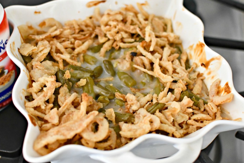 green bean casserole with crispy onions on top