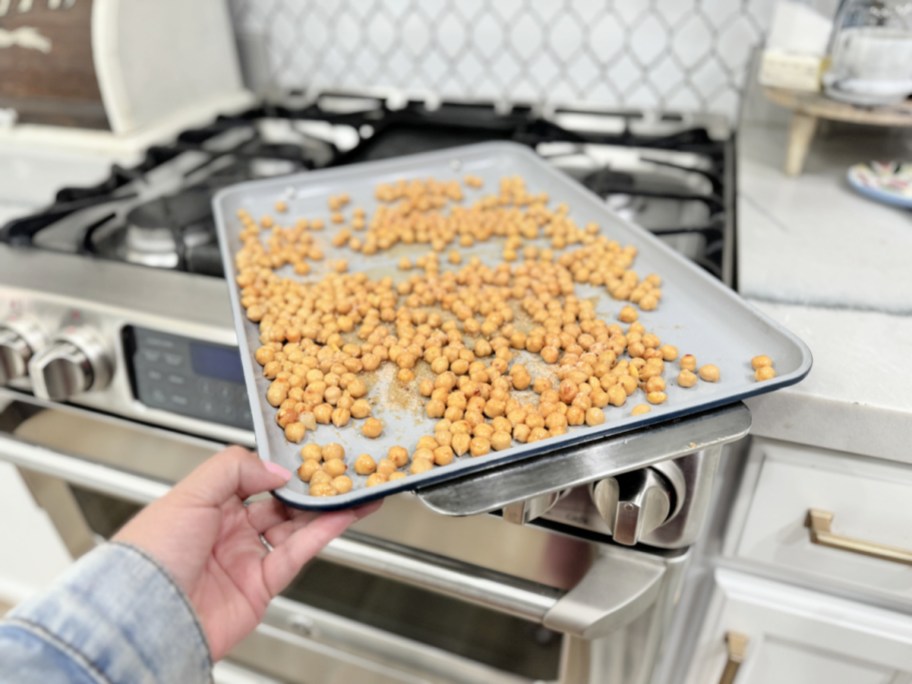 putting chickpeas in the oven