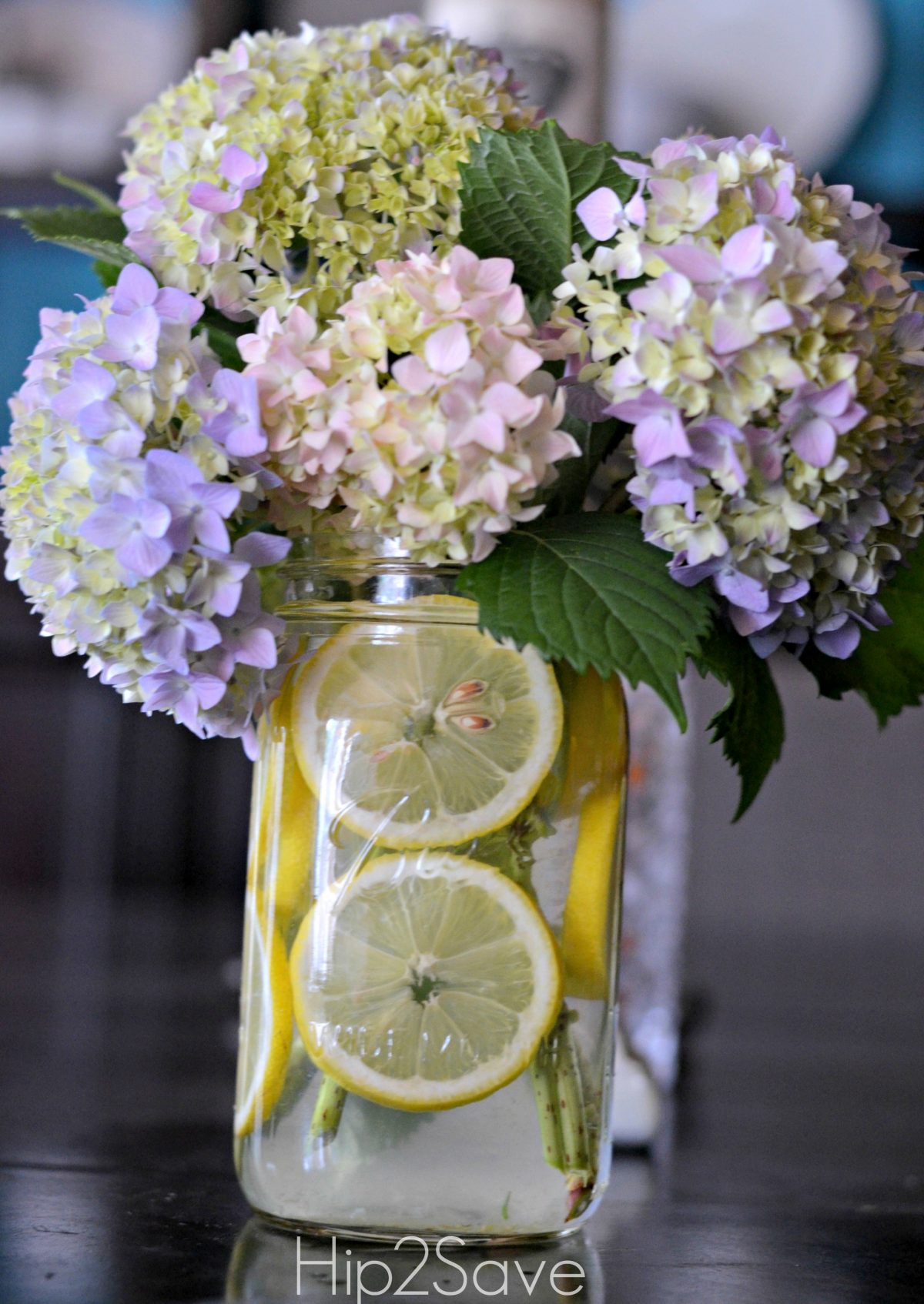 Lemons and flowers in a mason jar Hip2Save