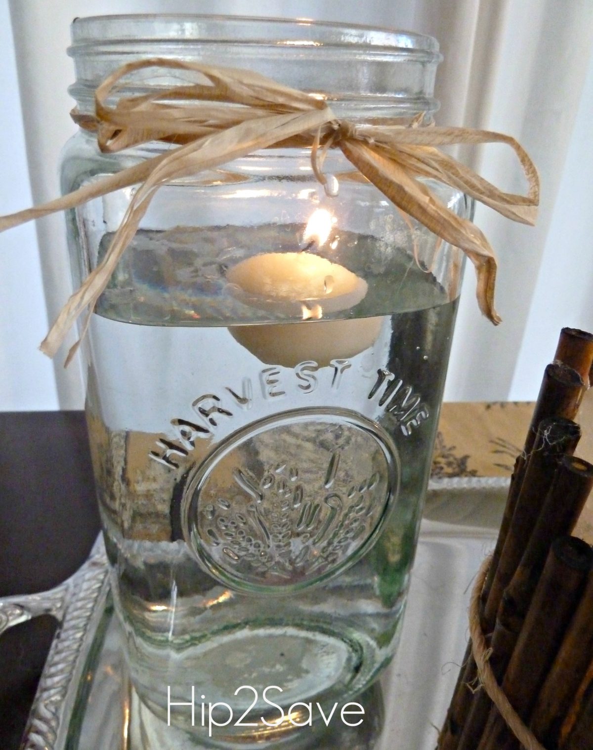 Mason jar with floating candle