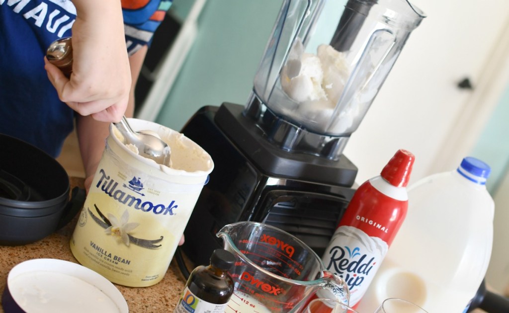 scooping out ice cream into blender