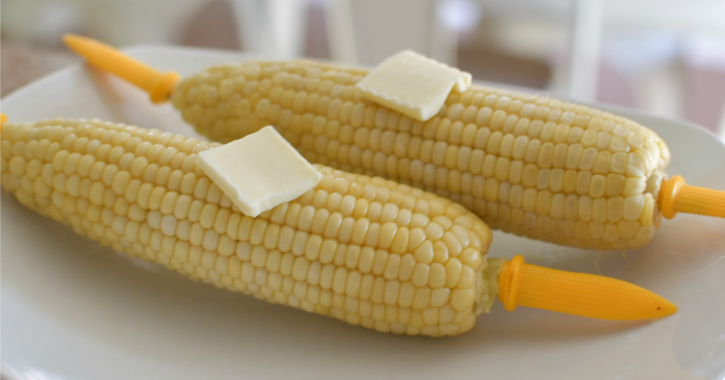 melting butter on corn