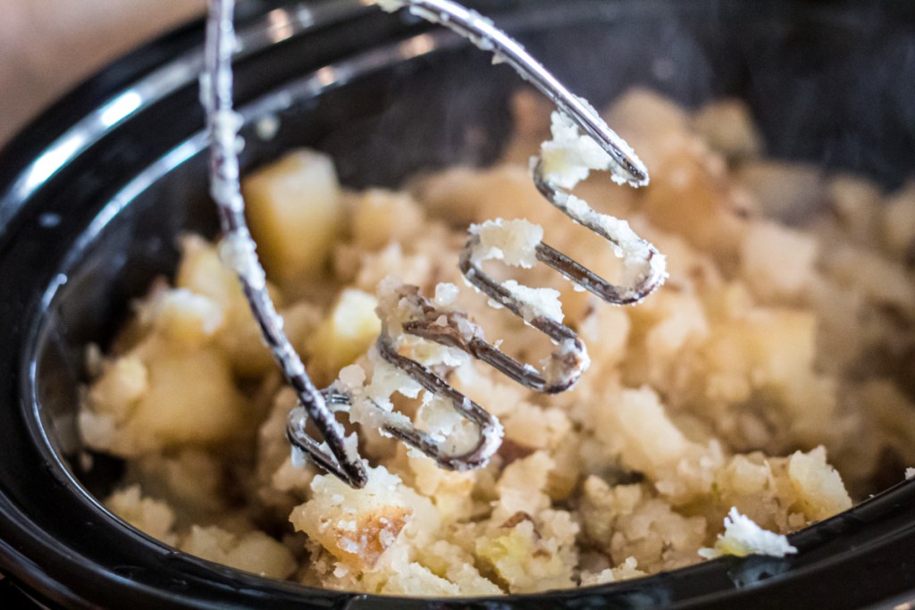 mashing potatoes in a crockpot