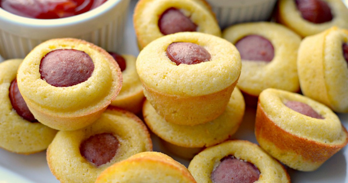 mini corn dog muffins recipe – arranged on a plate with dipping sauces