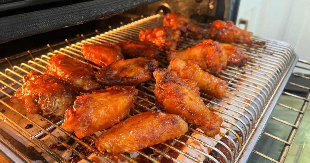 honey sriracha chicken wings in the oven after baking