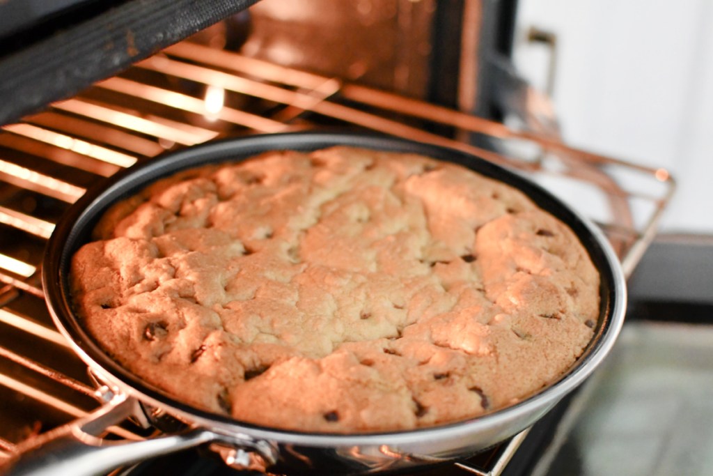 chocolate chip skillet cookie in the oven