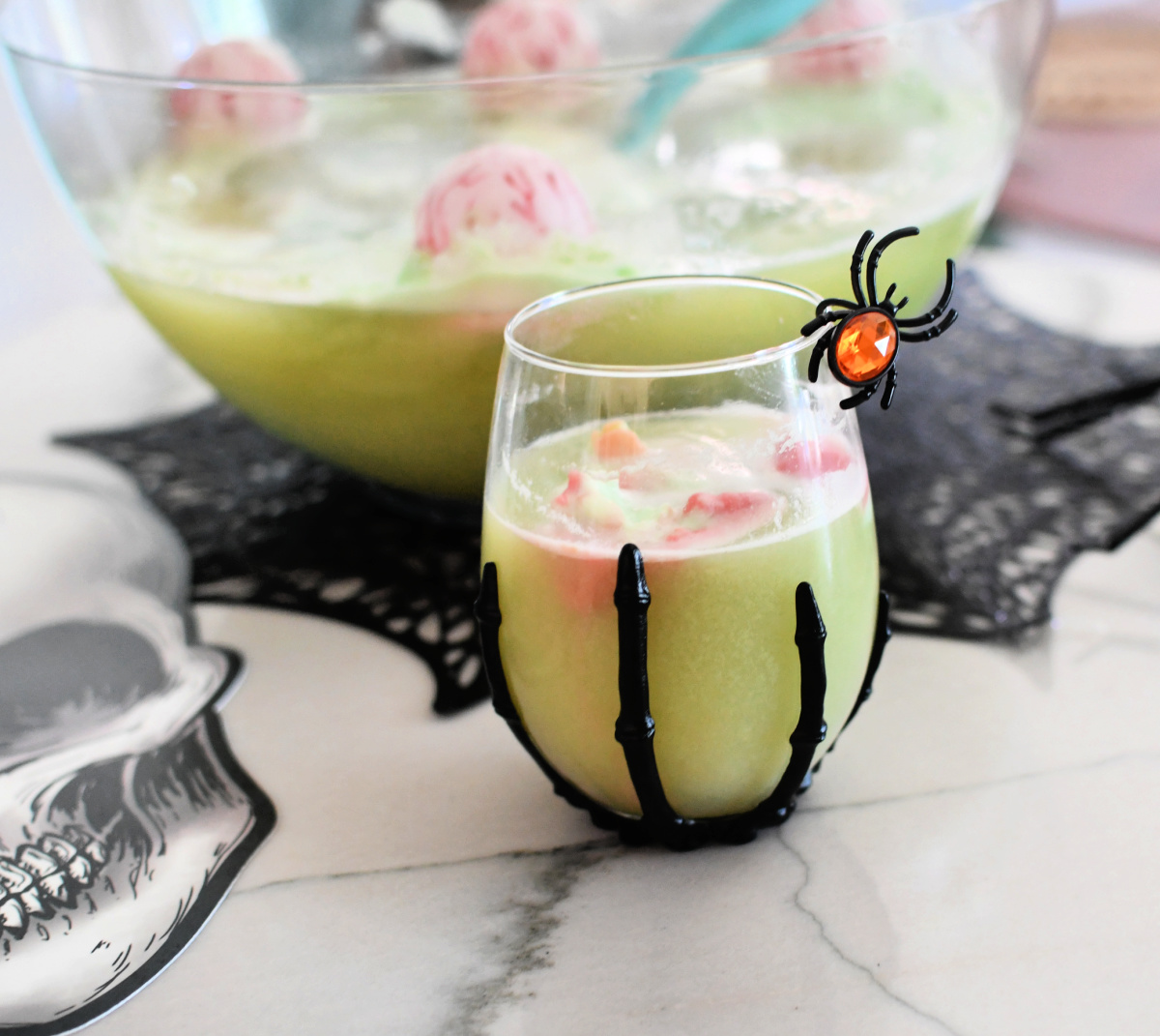 https://hip2save.com/wp-content/uploads/2015/10/halloween-wine-glass-with-halloween-punch-.jpeg?fit=1200%2C1071&strip=all