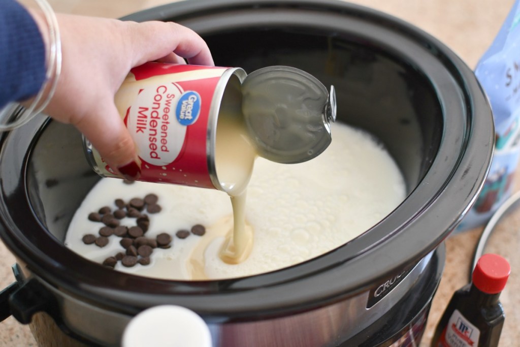 adding sweetened condensed milk to hot chocolate