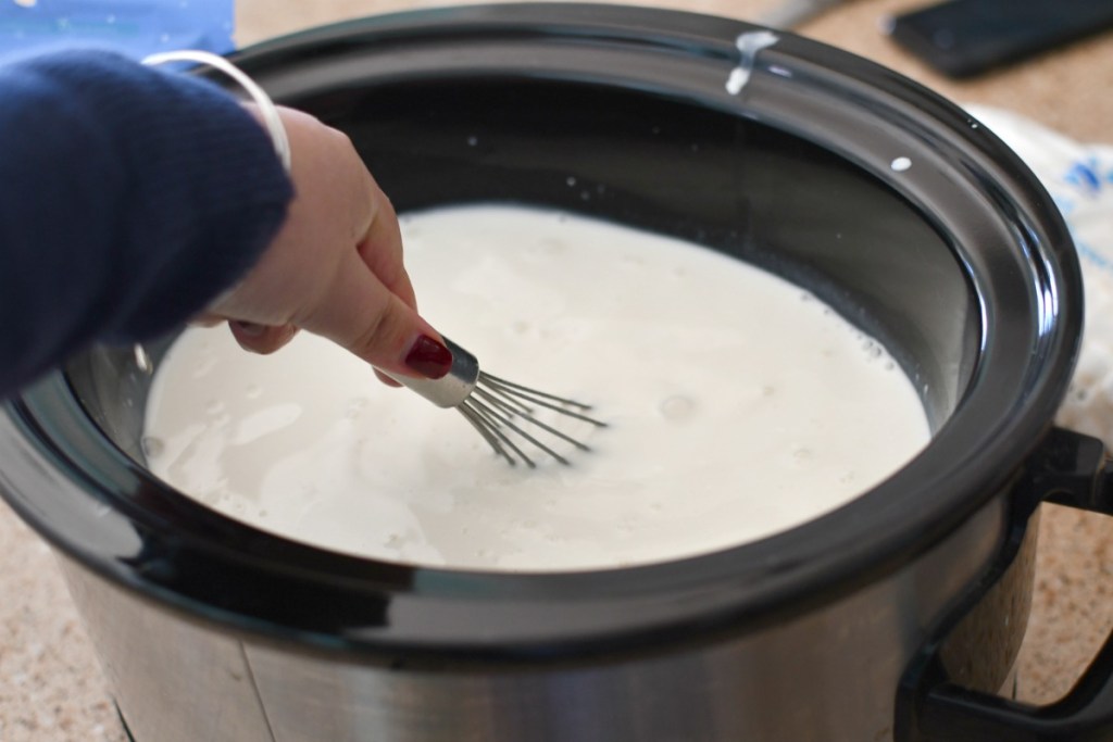 whisking together slow cooker hot chocolate