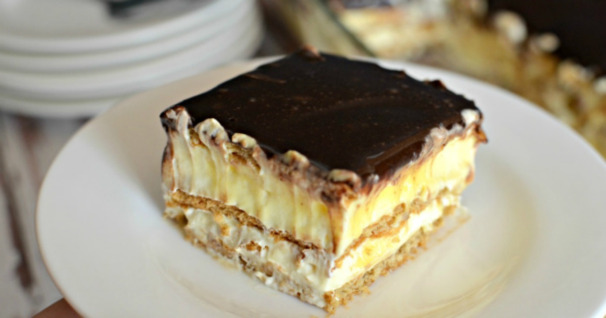 easy graham cracker eclair cake recipe – a slice of the cake on a plate