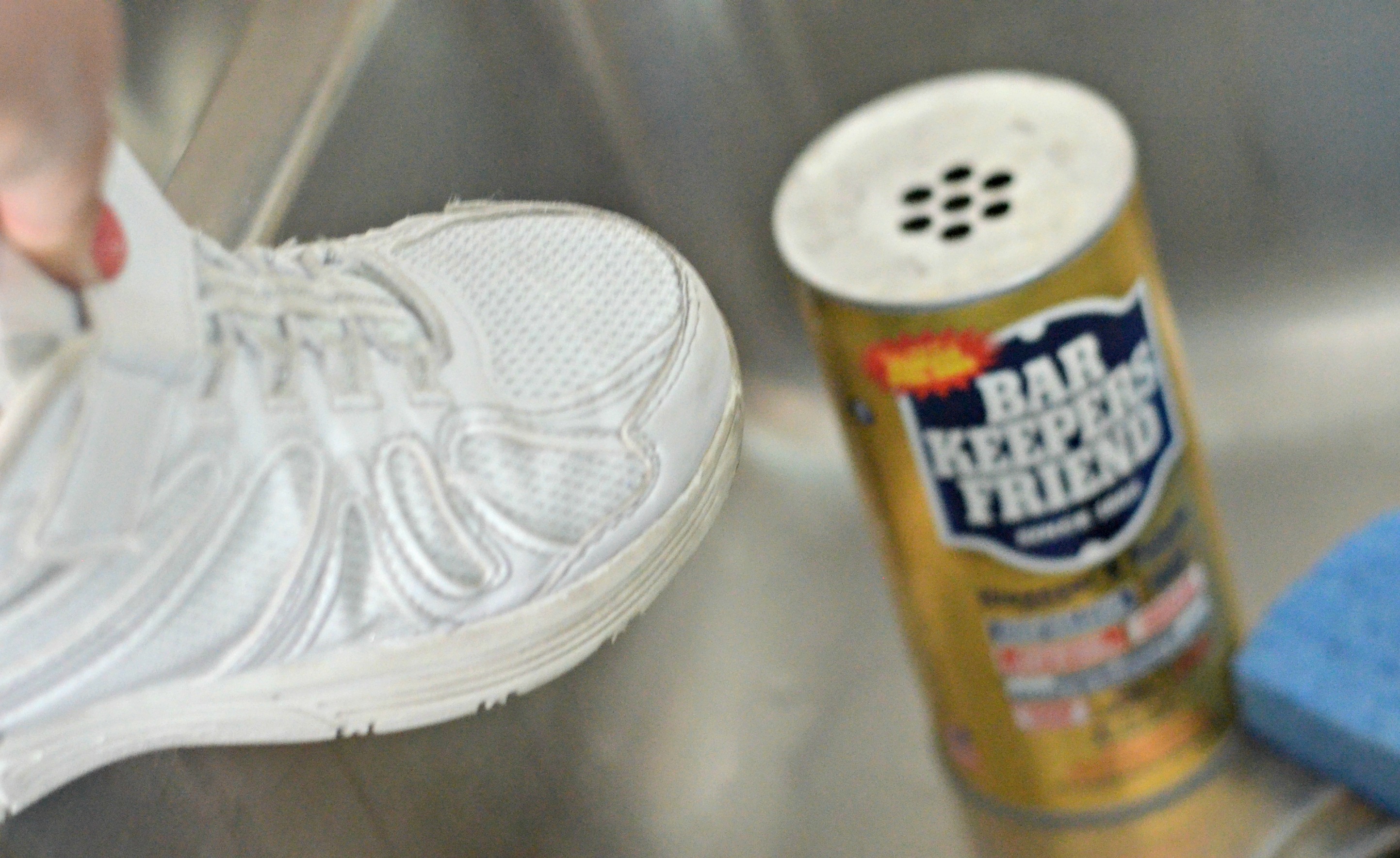 Bar Keepers Friend nest to a white sneaker