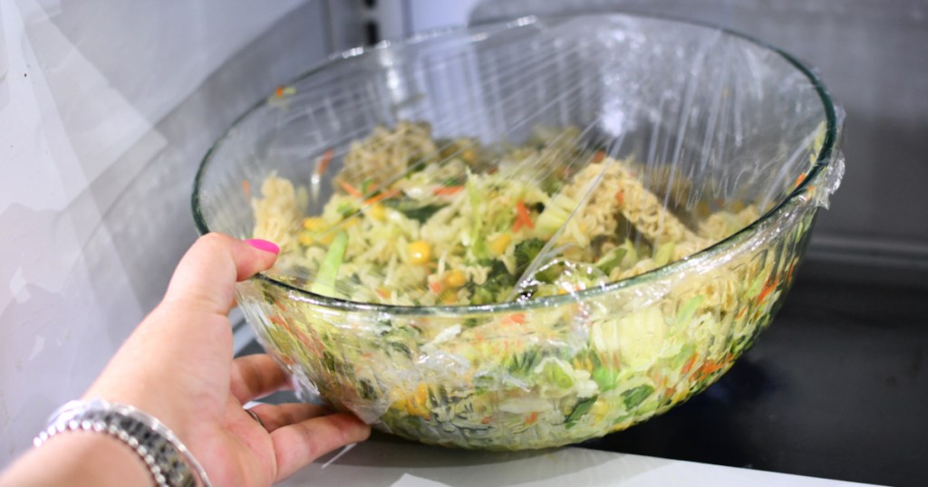 placing ramen noodle salad in the fridge