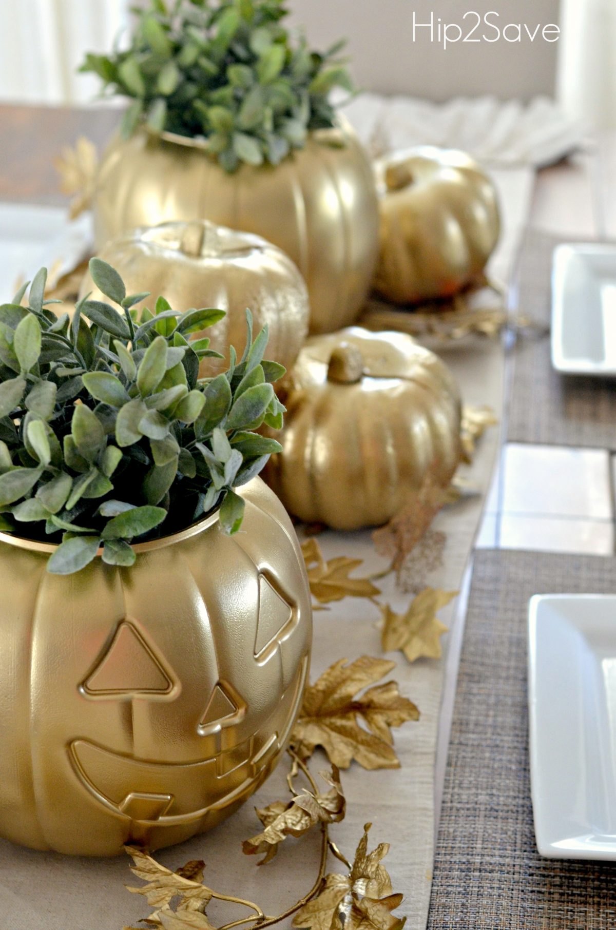 Budget-friendly dollar store fall decor with fall wreaths, autumn decorations, and stacked pumpkins for porch.
