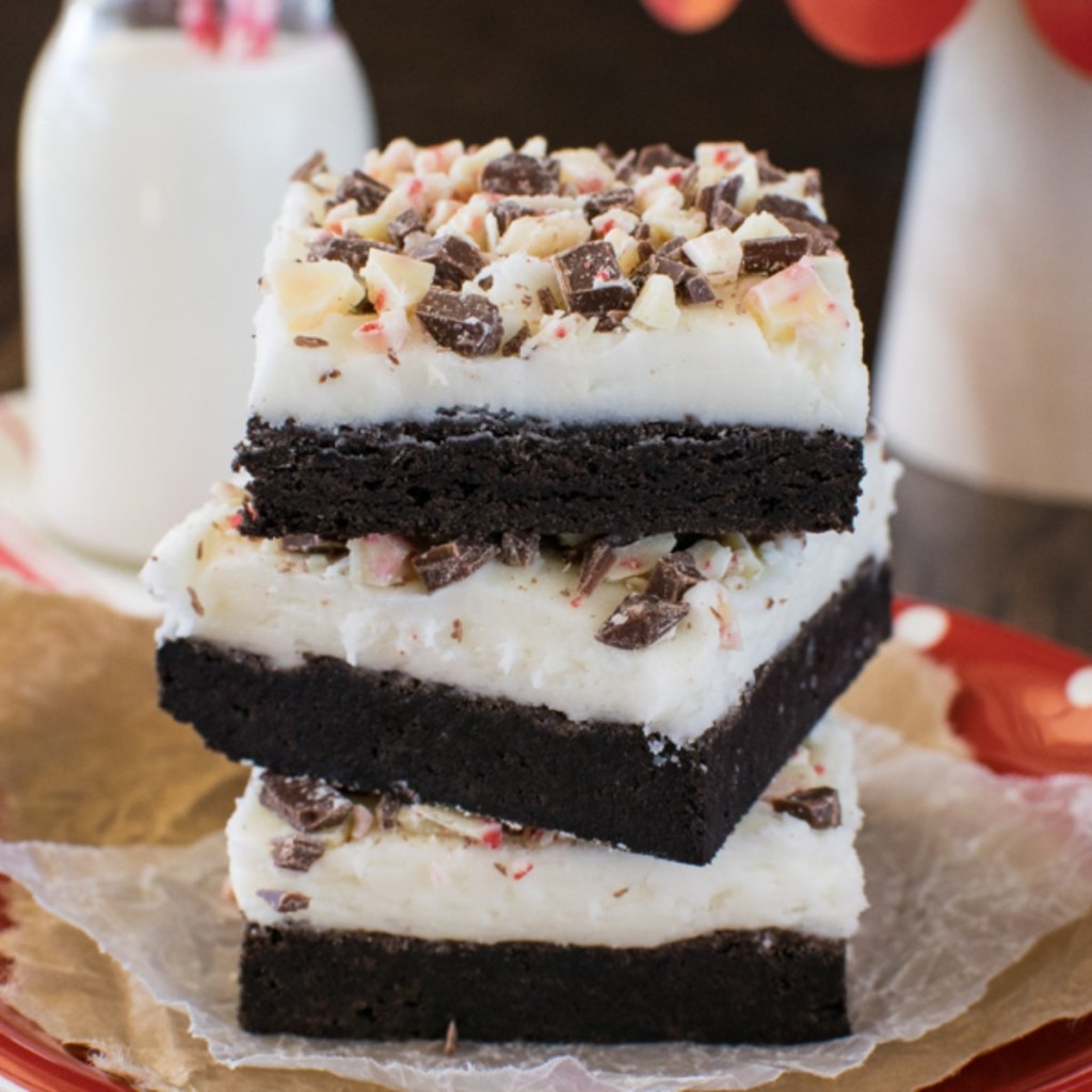 Chocolate peppermint bars stacked on paper