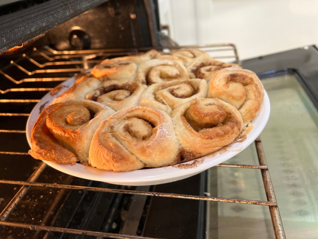 cinnamon rolls in the oven after baking