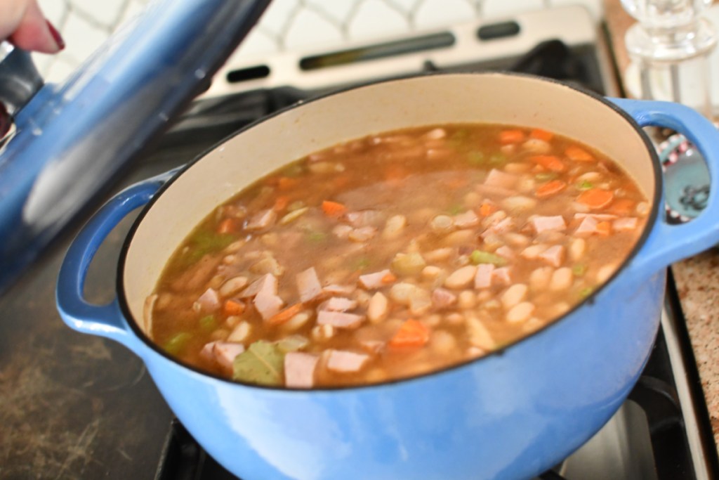putting a lid on ham and bean soup