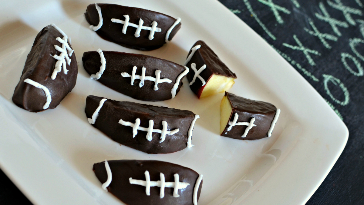 chocolate-dipped football apples - gameday food and football party food ideas