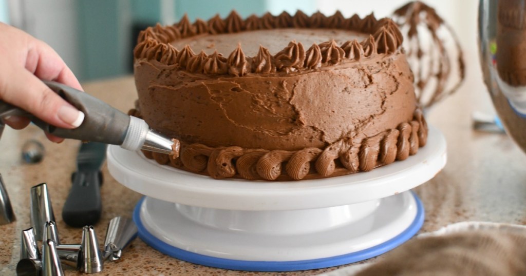 decorating a chocolate cake