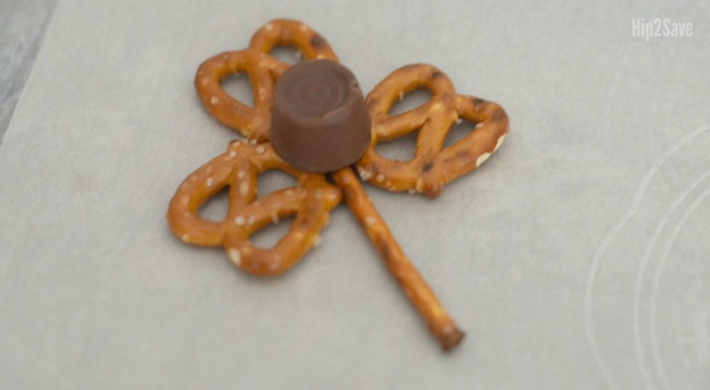 putting rolo on top of pretzels