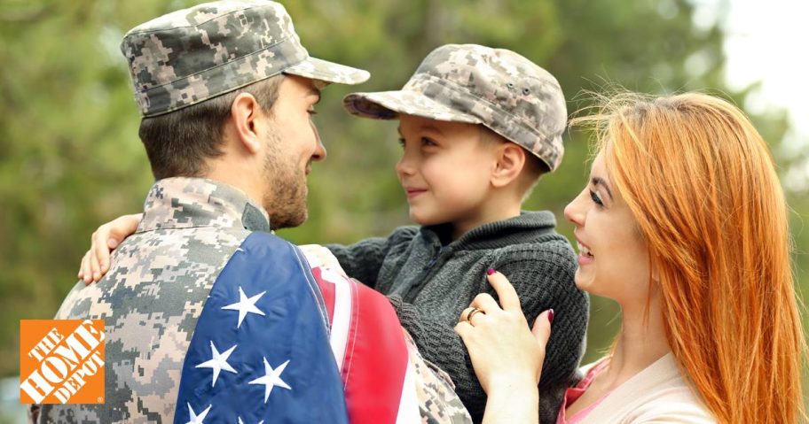 military couple with child and american flag