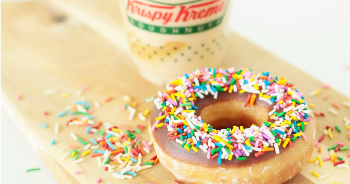 Krispy Kreme Doughnuts. Спасибо за пончики. Donuts Day. Sprinkles pouring on Doughnuts.