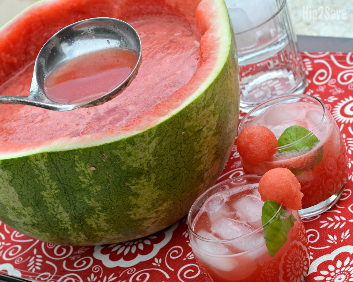 watermelon punch being ladled out of a watermelon bowl