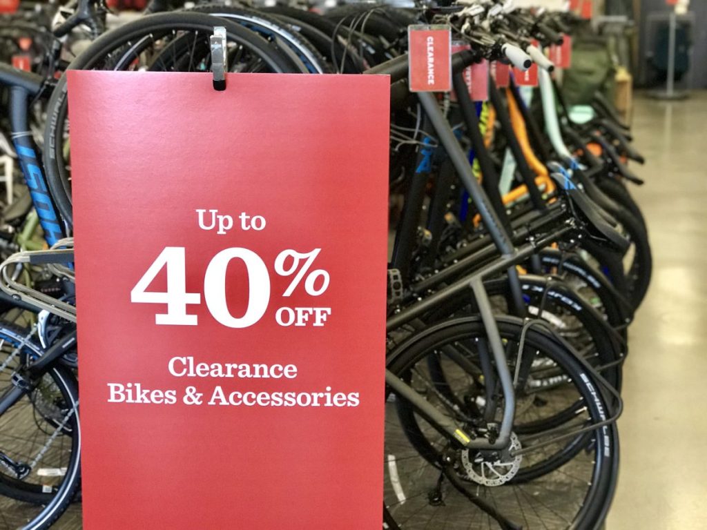 red 40 percent off clearance sign for bikes on sale