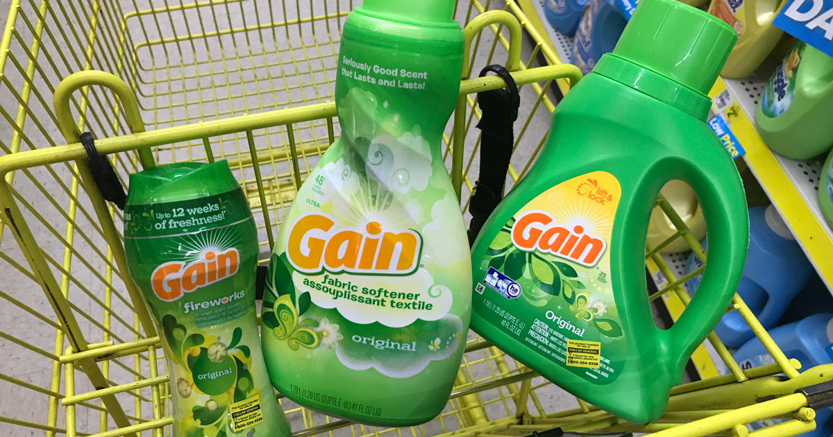 gain coupons from dollar general are good on products like these Gain-scented products in a shopping cart.