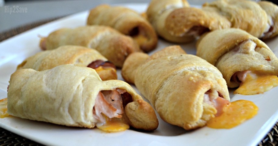 close up of turkey and cheese roll ups on plate