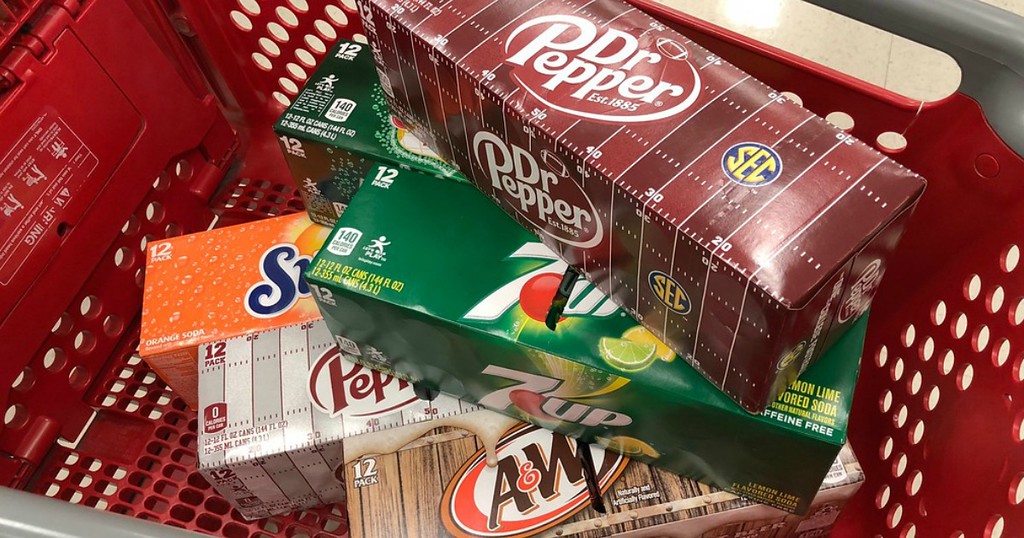three packs of soda in red cart 