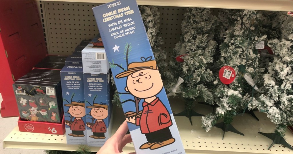 Hand holding Charlie Brown Christmas tree