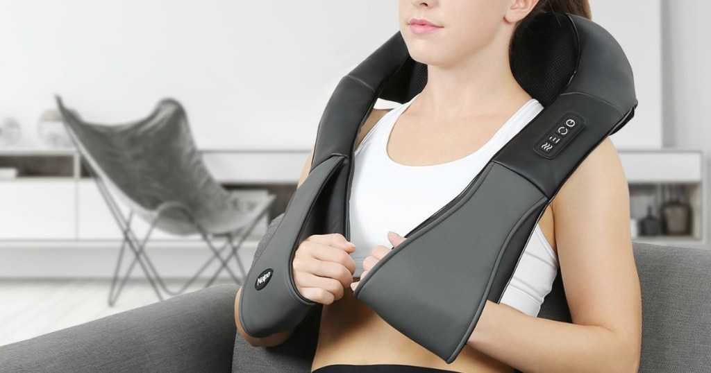 woman sitting with beck massager on