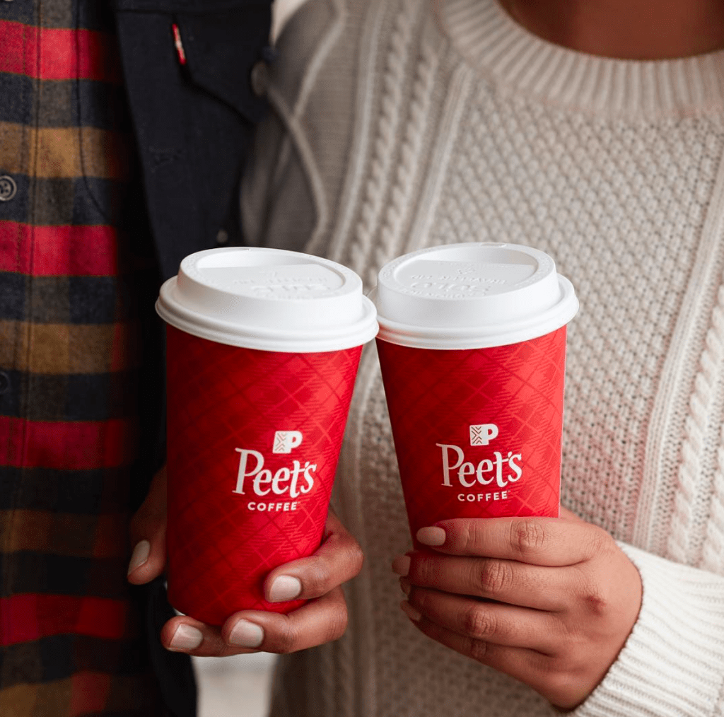 Friends holding Peet's Coffee cups