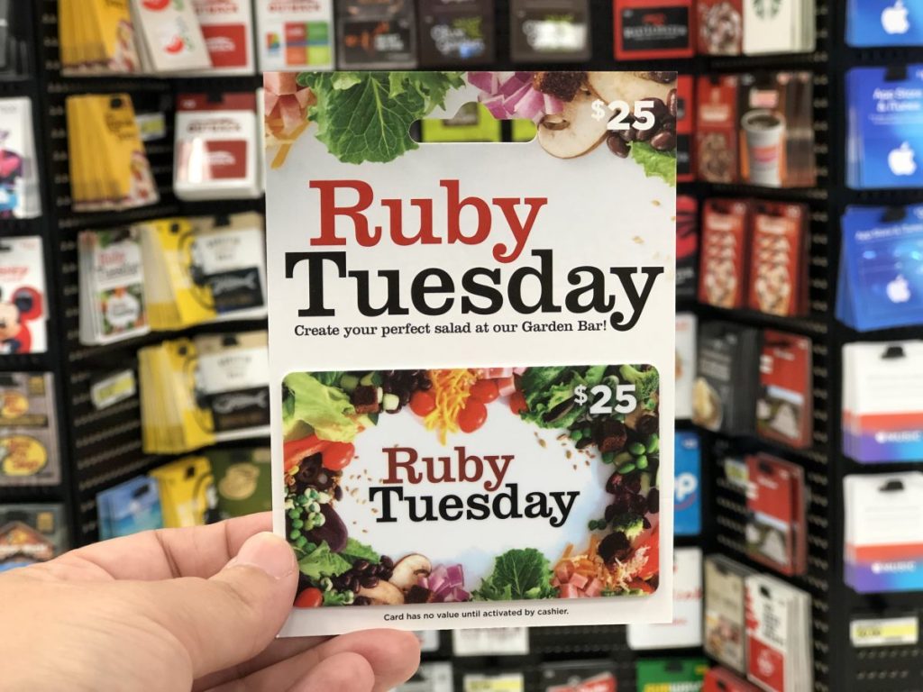 hand holding a Ruby Tuesday gift card