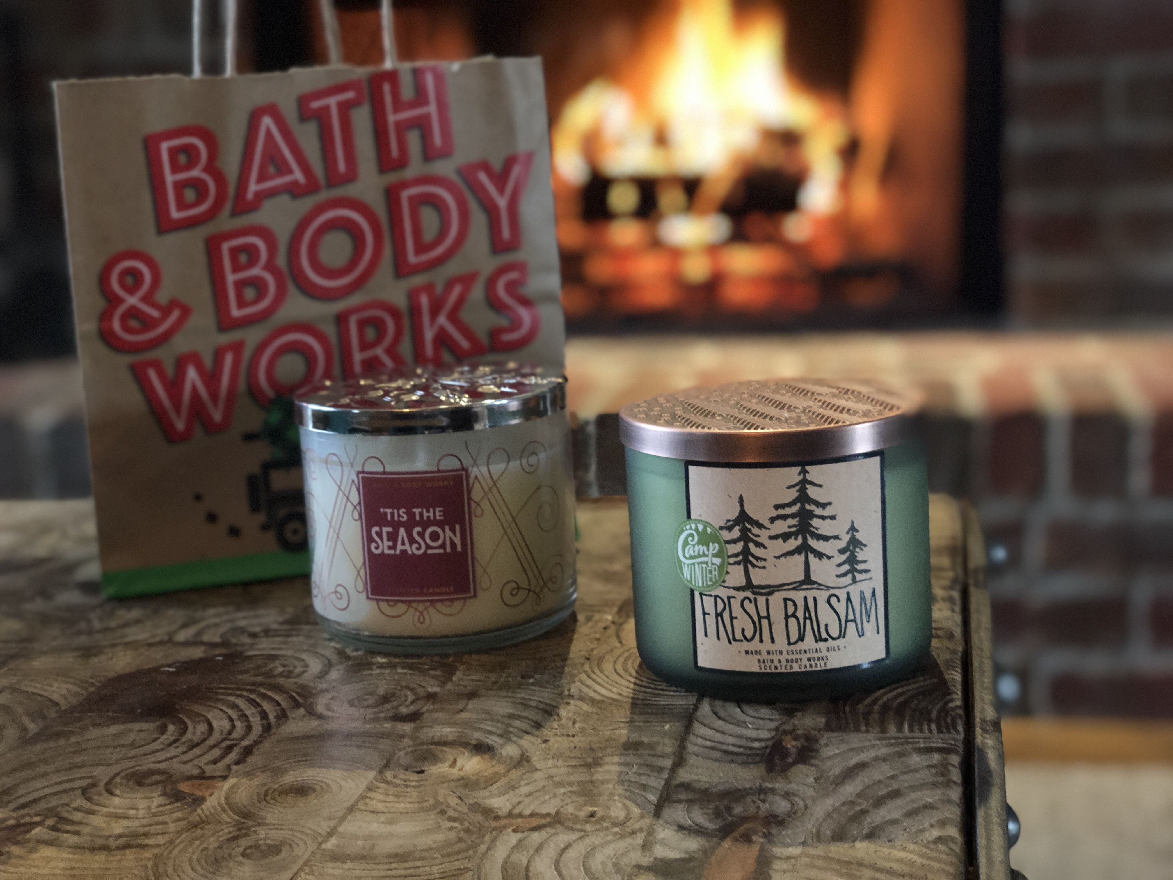 16 secrets for saving big at bath & body works – candles on a table near a fireplace