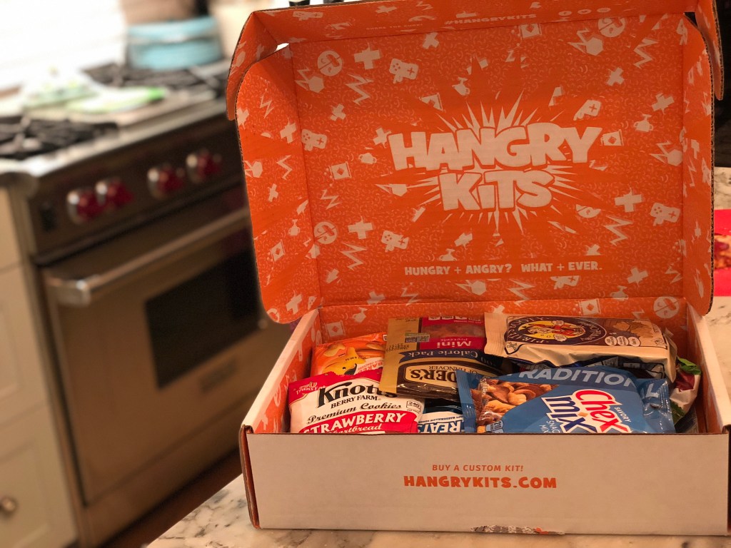 Hangry Kits make great college care package ideas and here is one open on a kitchen counter