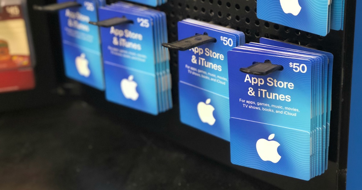 Apple App Store & iTunes gift cards on a store rack