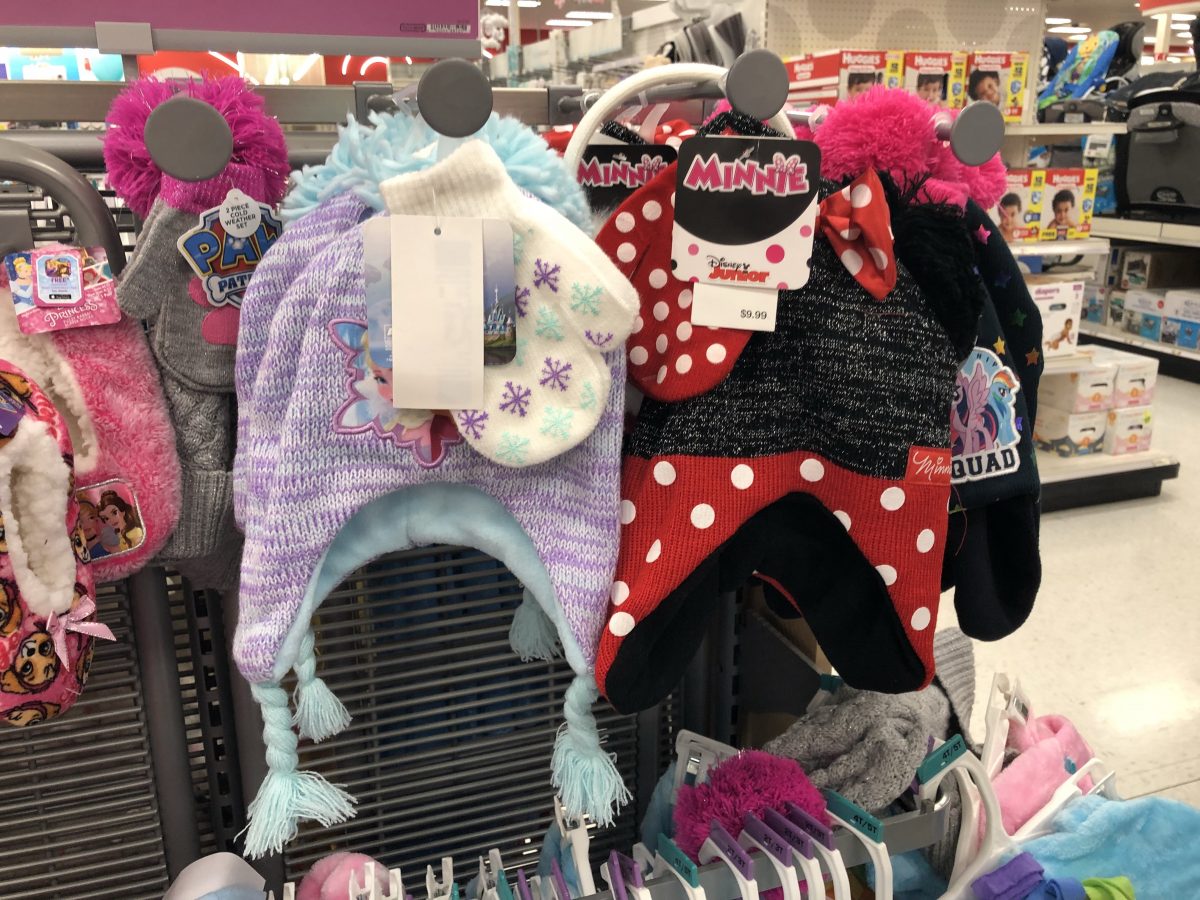 kids hats and mittens sets hanging on store shelf