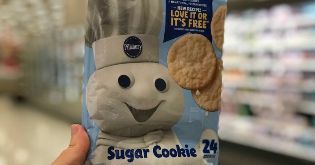 hand holding sugar cookie dough 