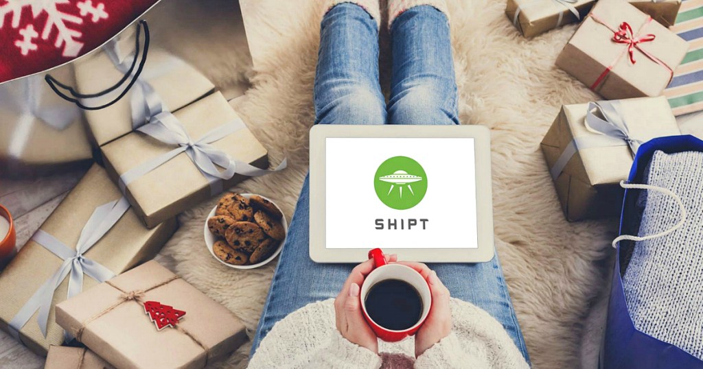 woman looking at Shipt on ipad with coffee
