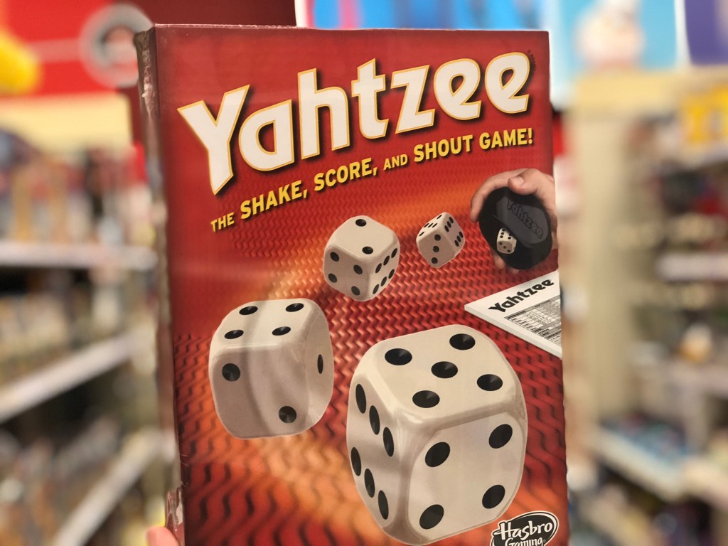Hand holding yahtzee game