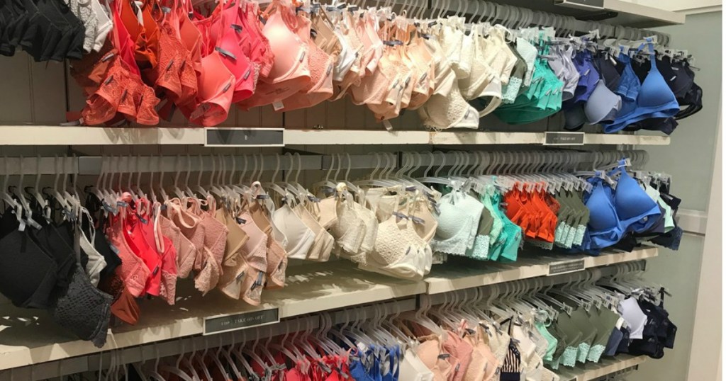 assorted bras hanging in-store