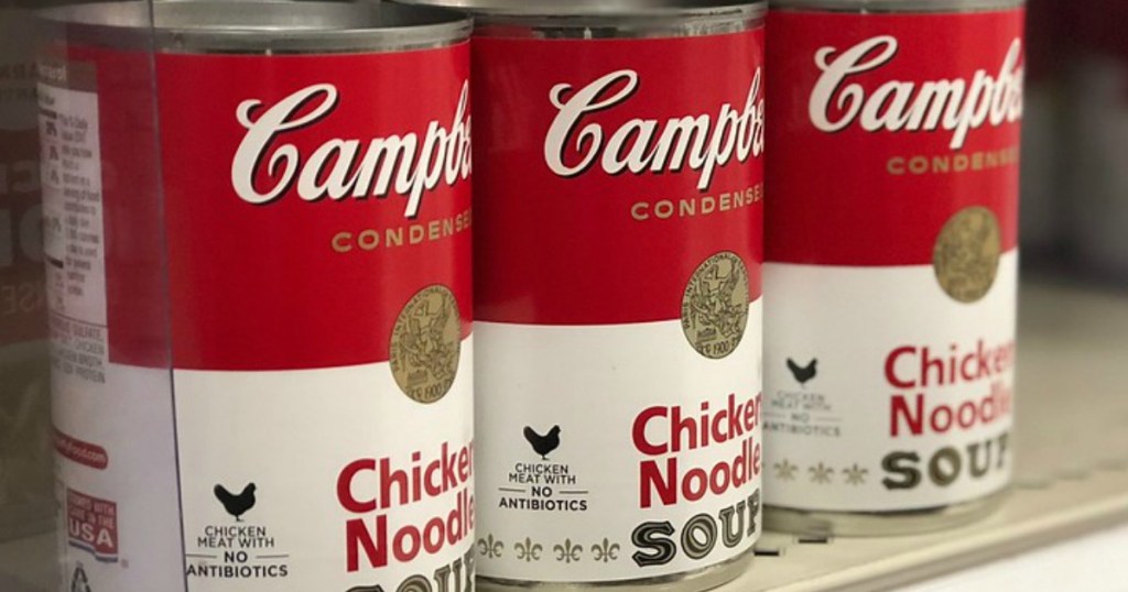 shelf of Campbell's Chicken Noodle Soup cans