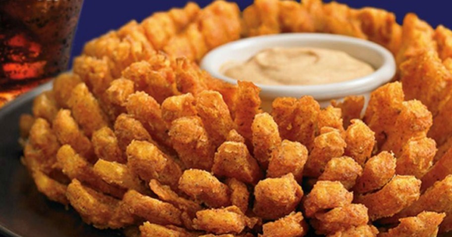 Outback Steakhouse Bloomin Onion on plate with sauce in the middle
