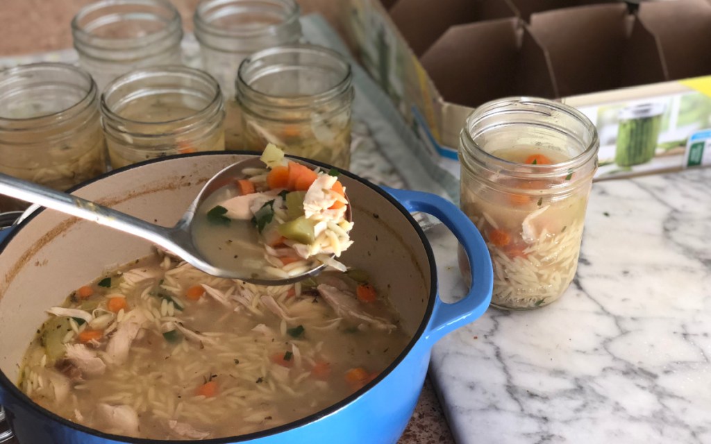 pouring soup into jars