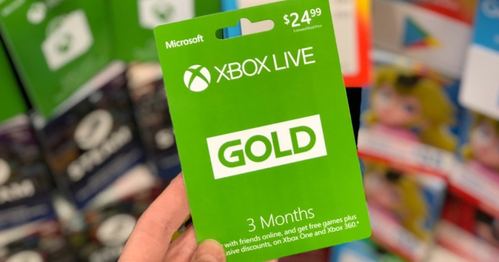 hand holding xbox live gold card