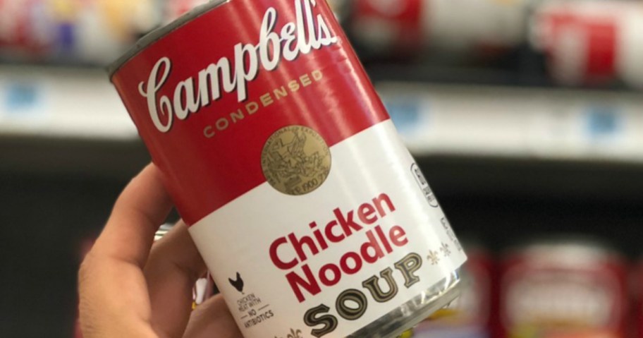 hand holding Campbell's Chicken Noodle Soup