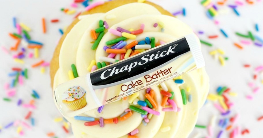 Cake Batter scented Chapstick lip balm on frosted cupcake with frosting