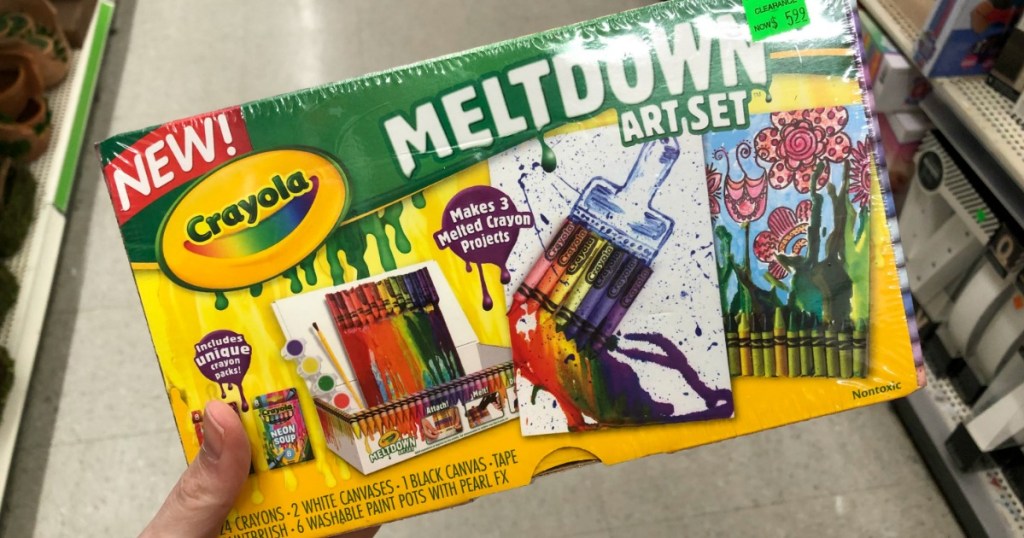 hand holdign Crayola Meltdown Art Set